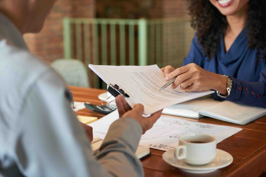 Man and woman reviewing a document
