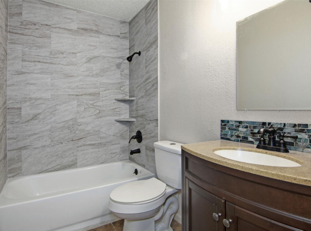 we buy Galveston houses and remodel bathrooms