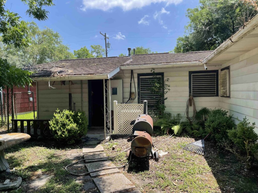 Front of a Home In Houston With Roof Issues That We Helped Sell