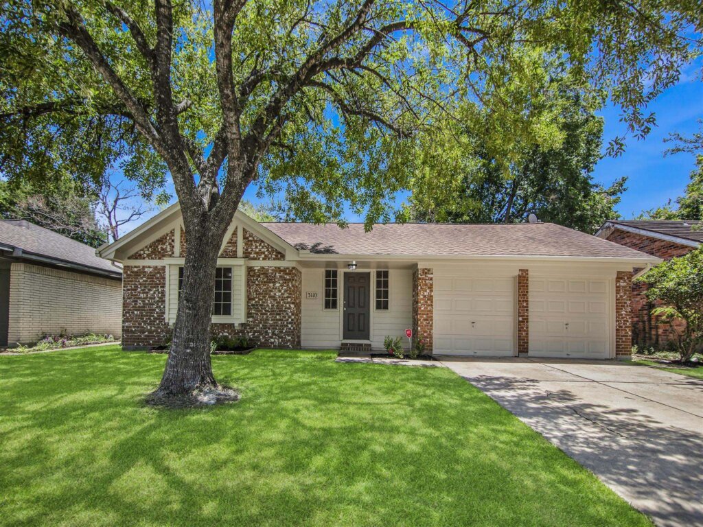 Front of a house in Houston that we bought with cash