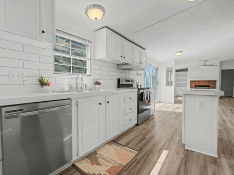 Close-up of kitchen countertops and cabinet space in the rent to own property at 105 Glenmont Ln.