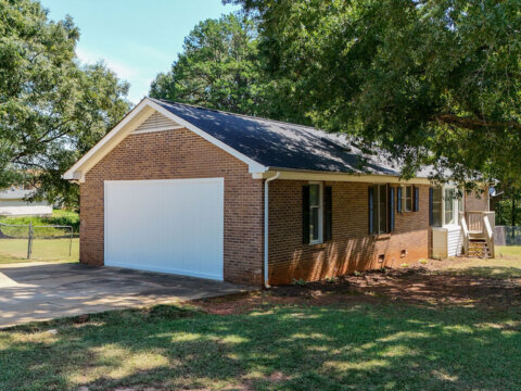 Attached garage of brick home for sale in Cowpens, SC