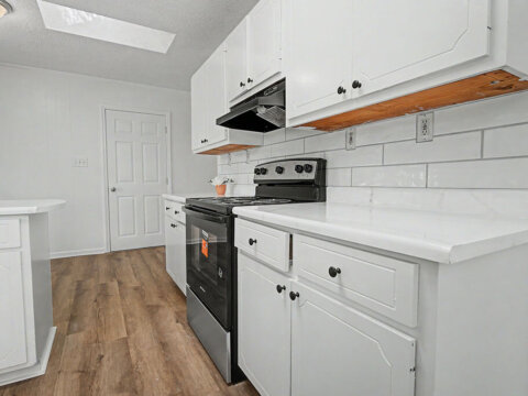 Kitchen with stove and appliances in Cowpens, SC home for sale