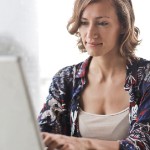 How to Find a Good Real Estate Agent in  | woman on computer