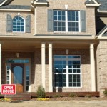 sell your home fast in | front view home open house sign