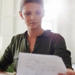 is owner financing a good idea for the seller i | white woman on laptop