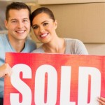 How To Sell A House Off Market | happy couple sold sign