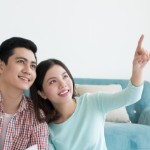 upgrades to invest in | asian couple woman pointing