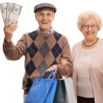 ideas for reinvestment | older couple shopping holding cash
