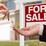 Sell Your Home Faster | handing keys for sale sign