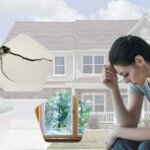 Homeowner dealing with stressful house repairs before selling