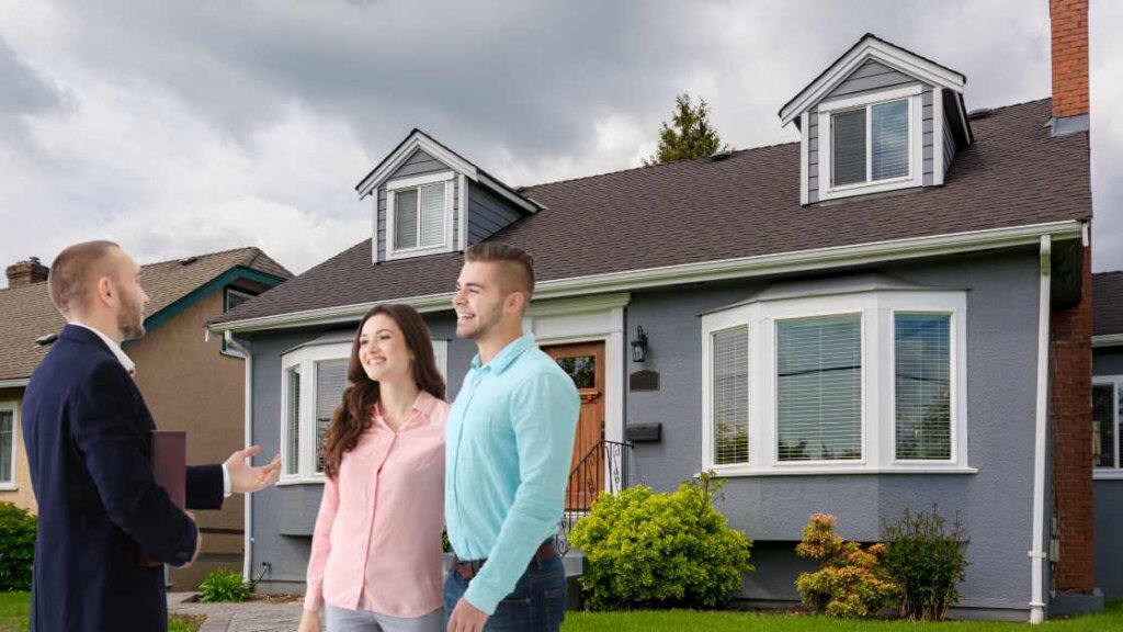 Real Estate Agent Discussing Home Selling Strategies with Home Sellers