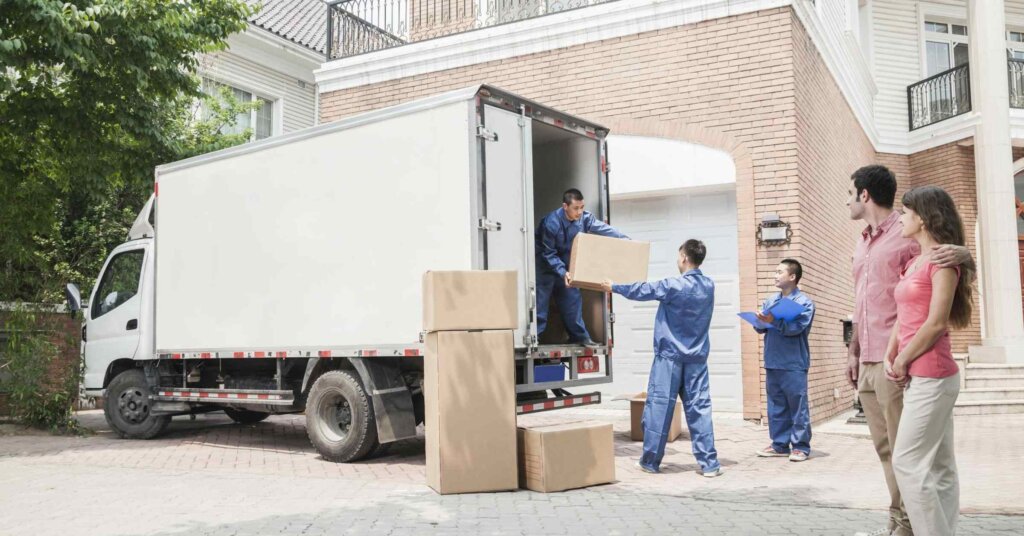 Moving truck and boxes outside a home – planning the move