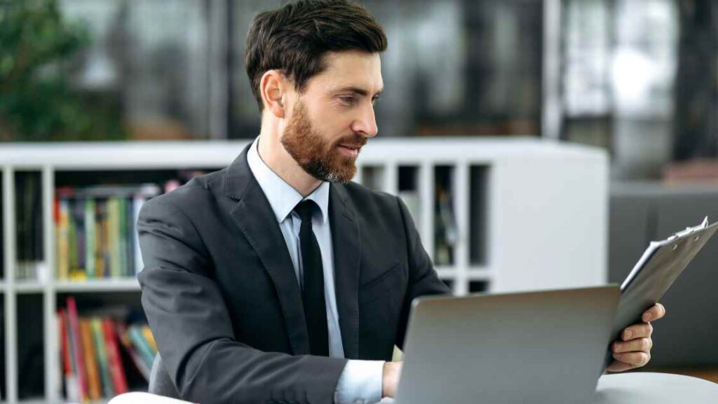 Real estate agent analyzing market data for home valuation