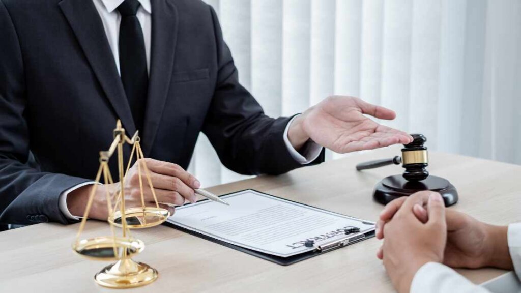 Real estate attorney holding documents related to a fast cash home sale.