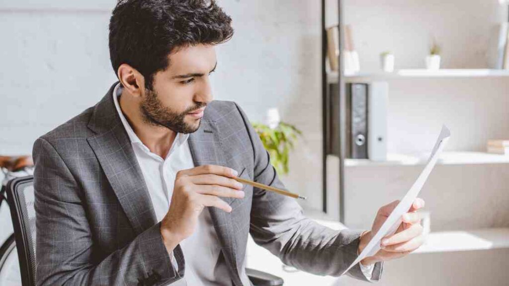 Seller comparing offers using a real estate agent's analysis