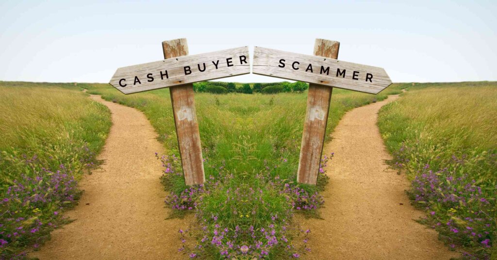 Two roads representing choosing the right cash buyer or a scammer