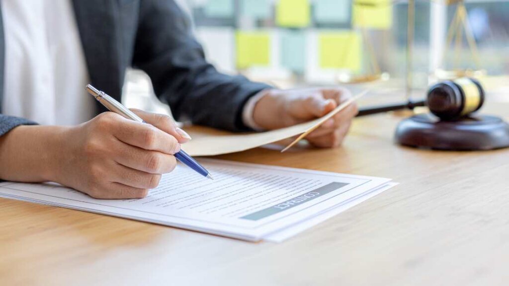 A lawyer reviewing legal documents, representing the essential role of a solicitor in quick house sales