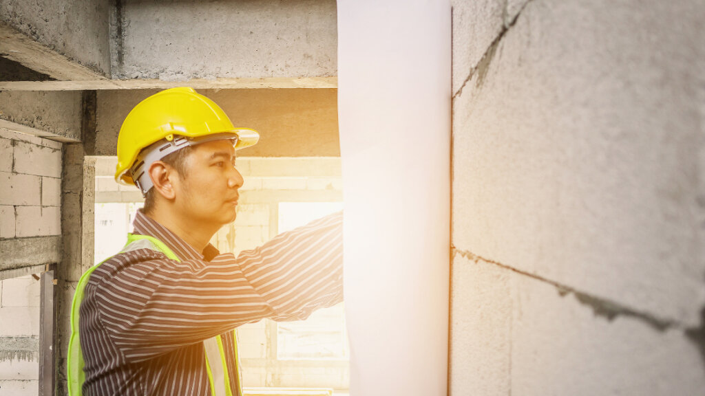 Photo of a local government authority conducting an inspection of a property, highlighting the role of authorities in identifying code violations and safety concerns.