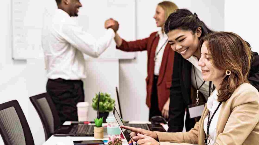 Group of real estate agents discussing property sales
