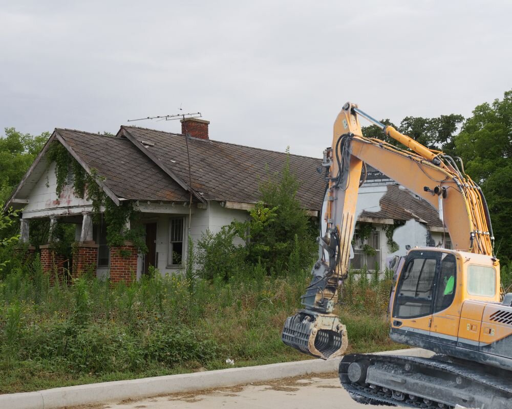 Comparing the options of repairing versus demolishing a condemned house to determine feasibility