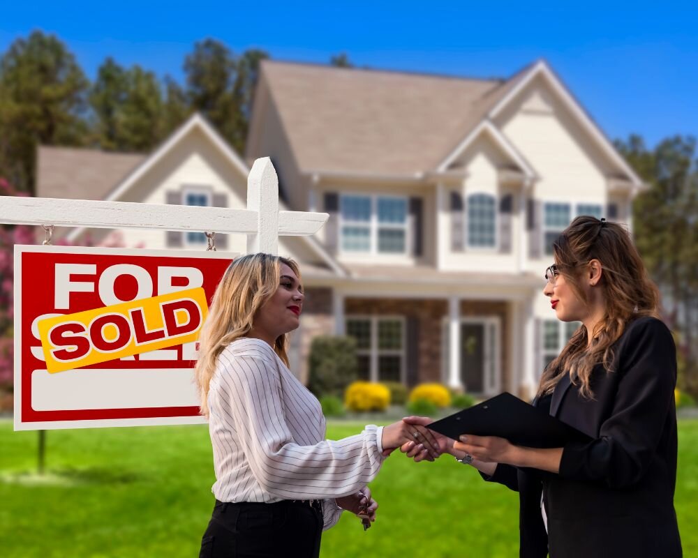 A professional handshake between a home seller and buyer in front of a residential property