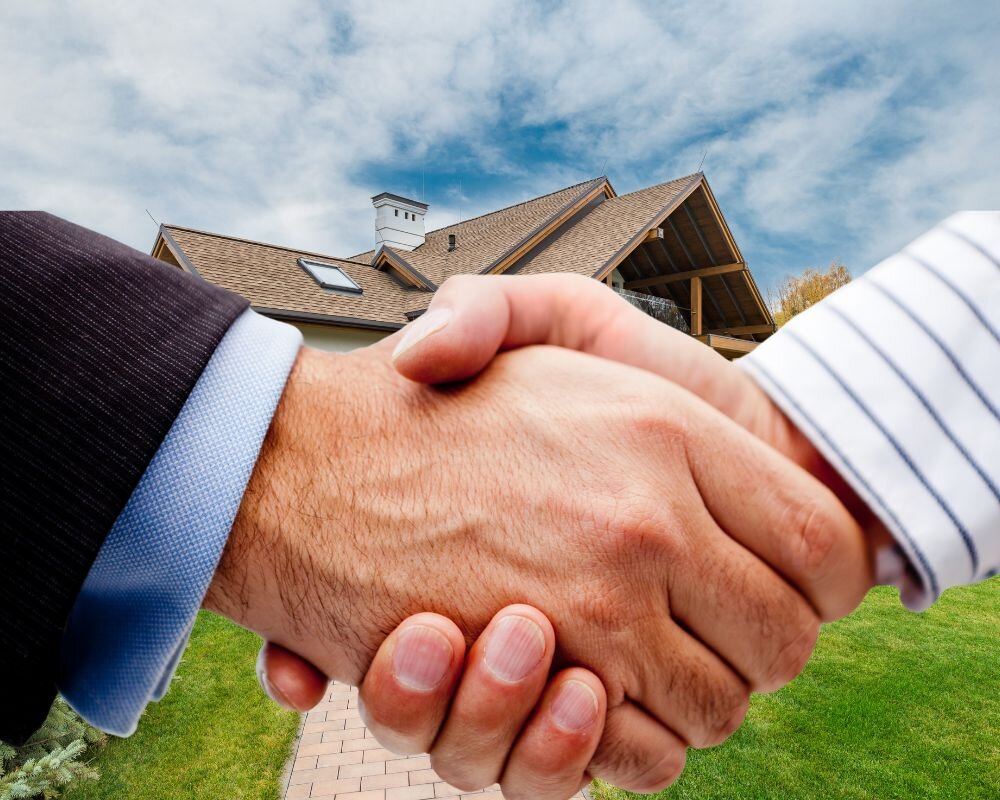 Buyer and seller agreeing on fair market value in a real estate deal.