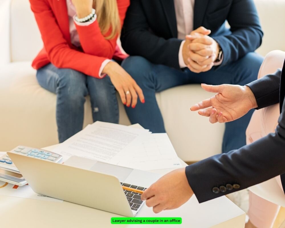 Divorce attorney advising a couple on legal aspects of dividing assets.