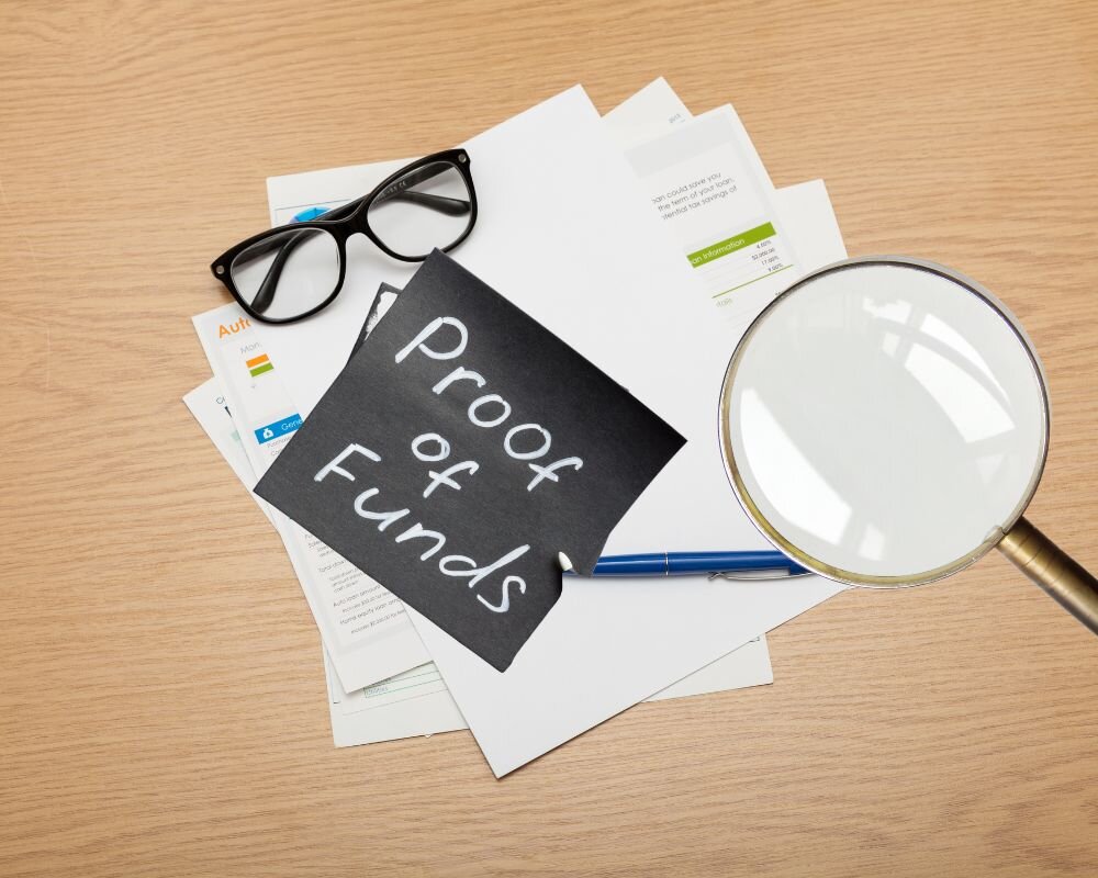 Proof of funds document being examined with a magnifying glass