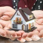 What happens when you inherit a house | hands holding house