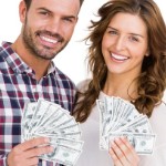 How to Sell Your House for Cash | smiling couple holding cash
