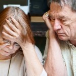 Dealing With Tenants Who Don't Pay Rent | frustrated older couple
