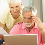 sell your home | old couple on computer