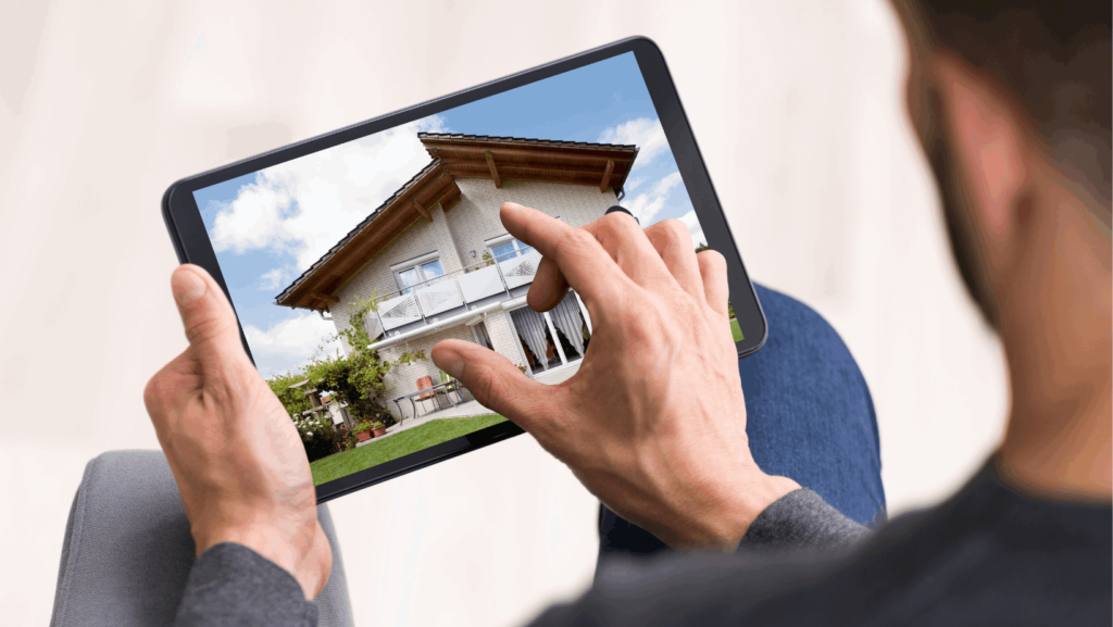 man looking at a real estate investment portfolio