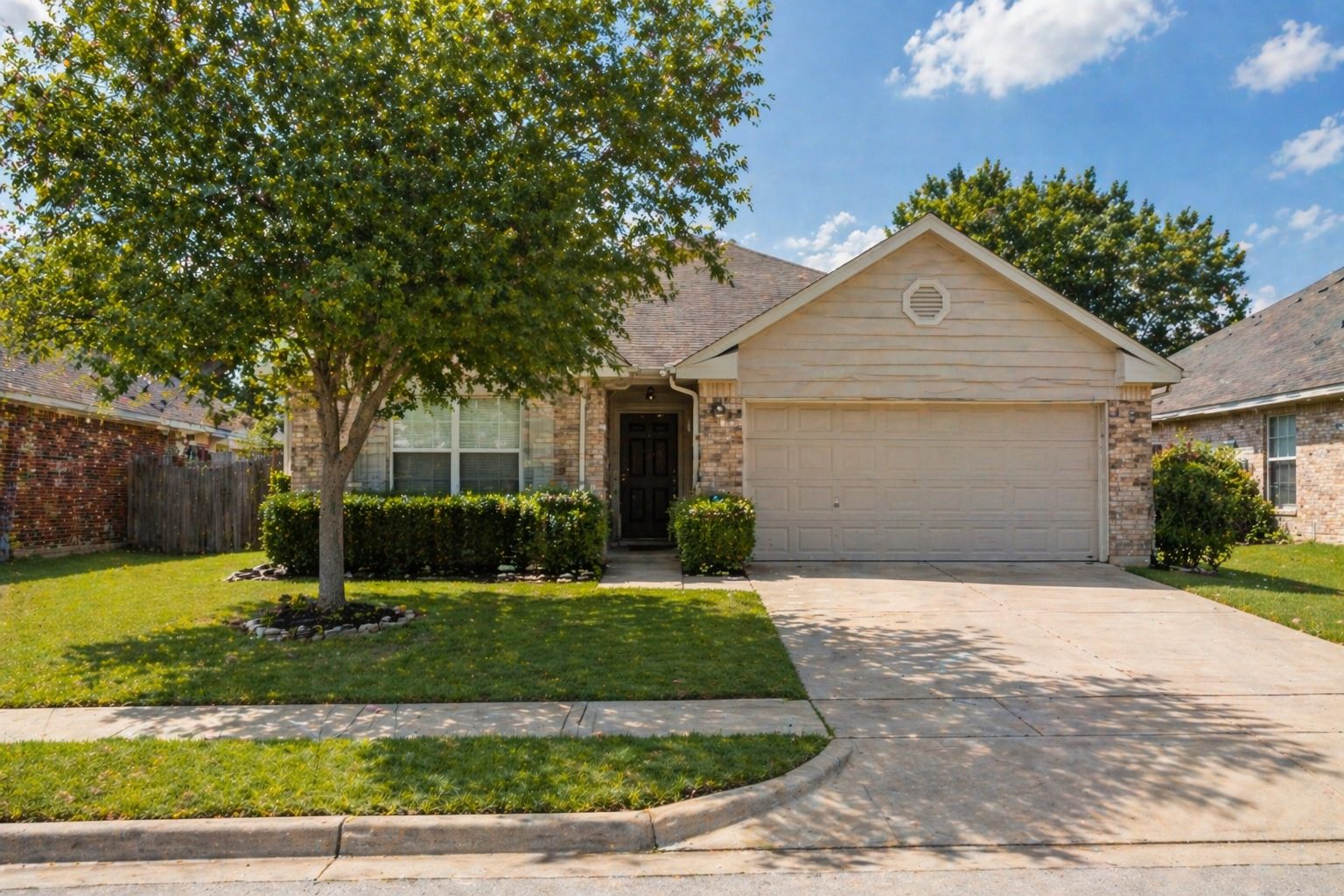 home exterior in Bryan Texas representing comparison between new construction and resale homes