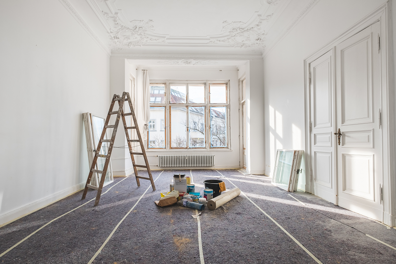 Photo of a room in a house being painted to increase its curb-appeal