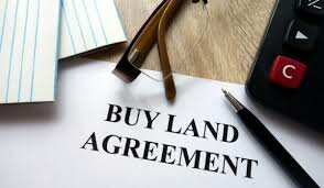 We buy vacant lots in Birmingham and pay cash for houses.