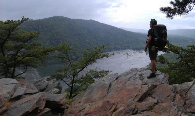Aaron enjoying the view from the trail on a local backpacking trip.