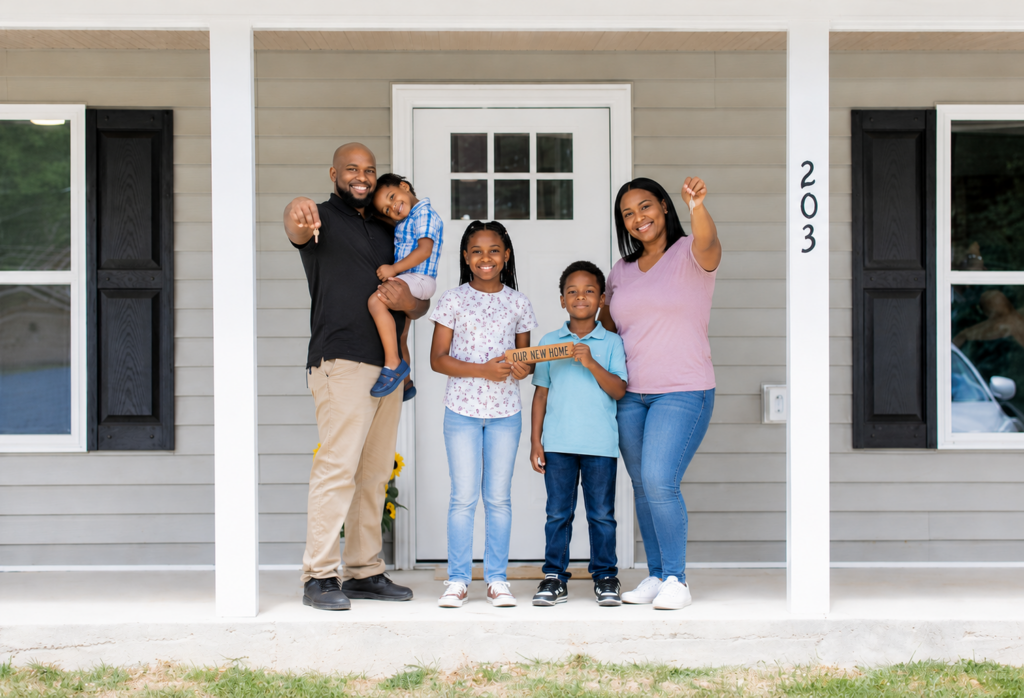 Family celebrating buying a home with owner financing in Texas