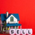 Model house next to dice spelling SELL, things to do before selling your house in Chino, CA