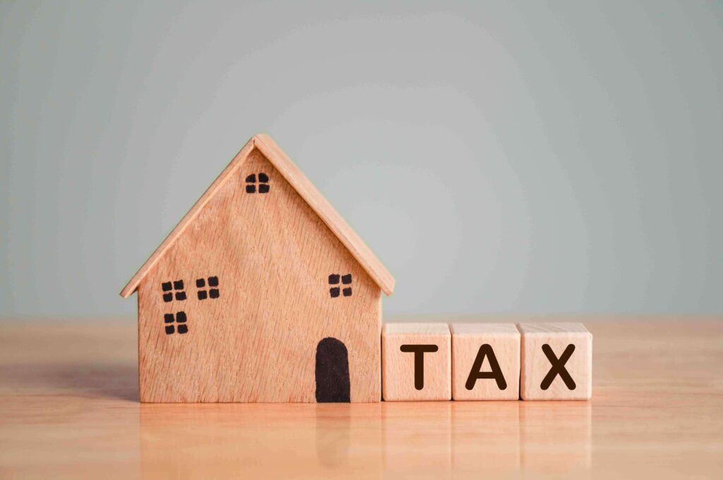 image of a house and taxes