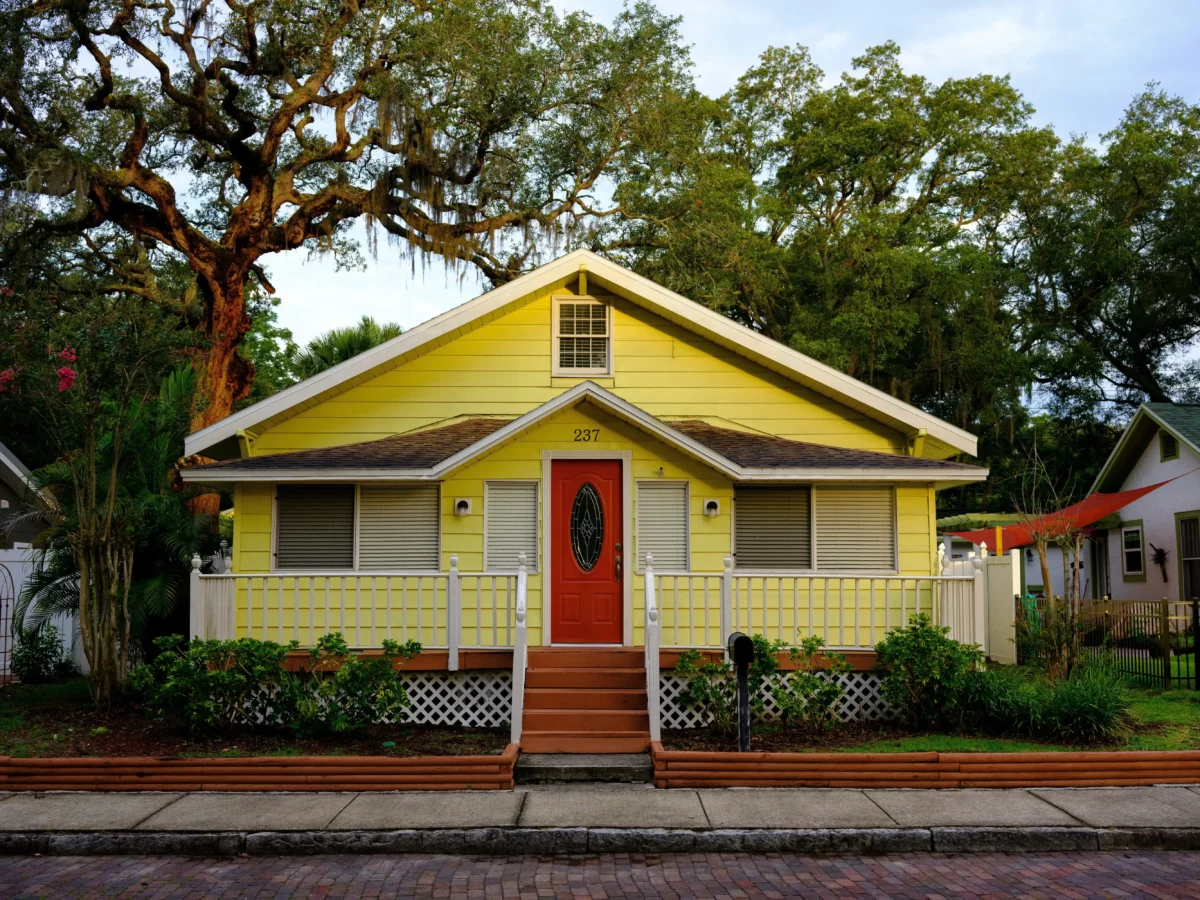 yellow home with red door florida