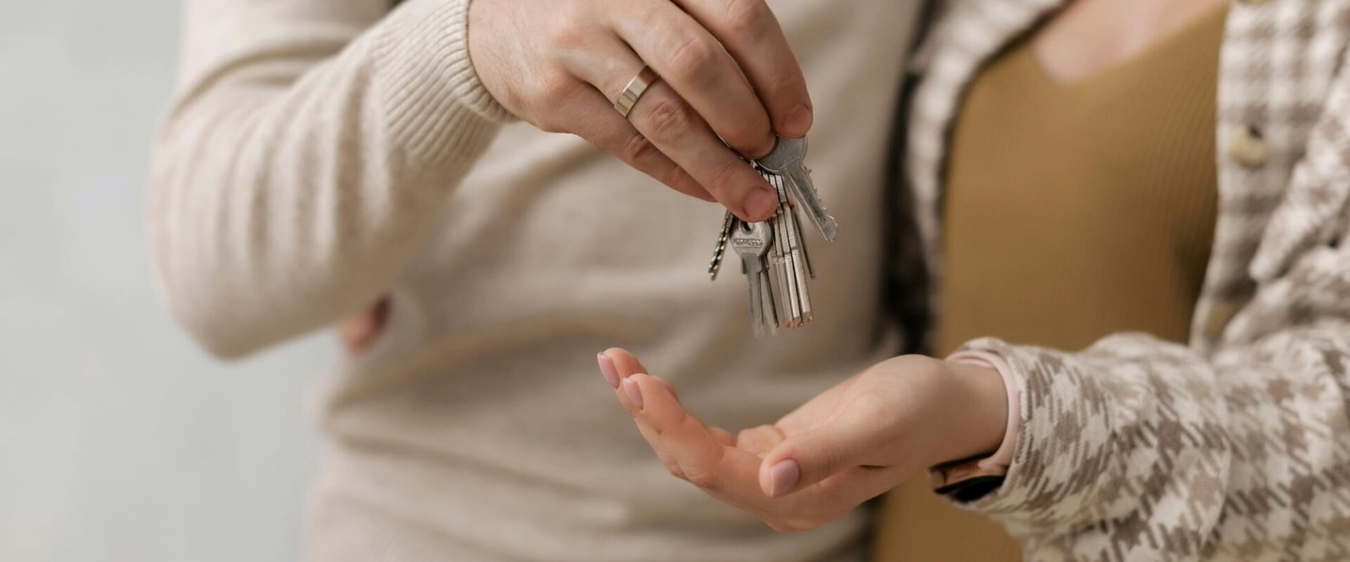 couple holding house keys