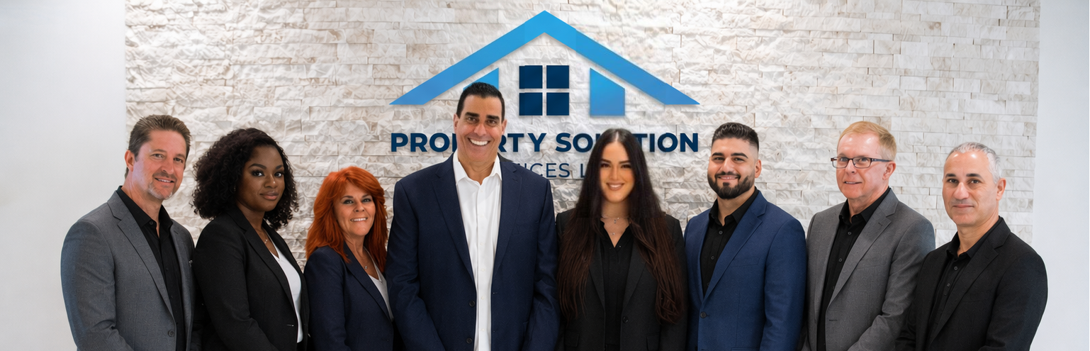 Property Solution Services team standing together in the South Florida office with nearly 30 years of combined experience helping homeowners sell houses fast for cash.