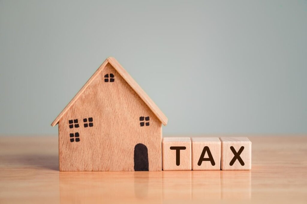 Landlord reviewing rental property sale and tax documents in Pembroke Pines, Florida