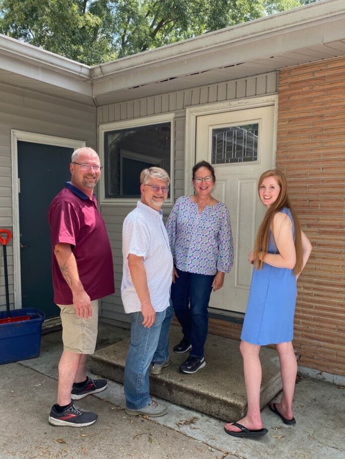 Mark, Eric, Anna and Mary visit an Omaha property