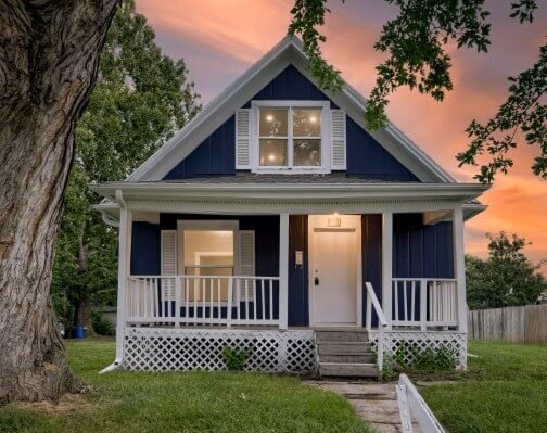 House after rehab by Anna Buys Houses, exterior view.
