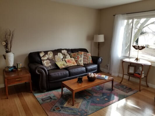 Living room in Omaha, NE home that was remodeled by Anna Buys Houses.