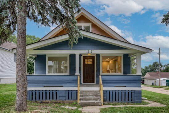 Exterior view of a house after being remodeled by Anna Buys Houses.