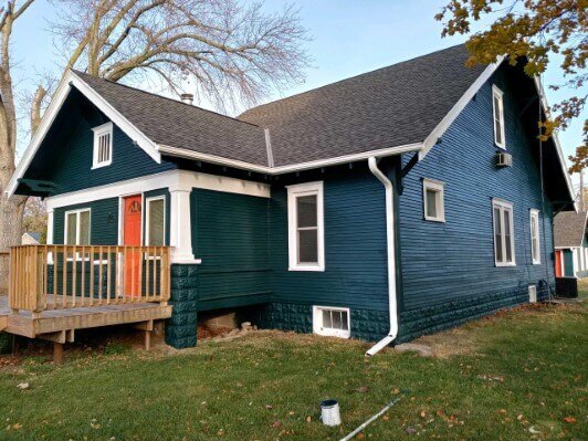 Finished exterior paint job on an Anna Buys Houses Tekamah, NE property purchased as-is.